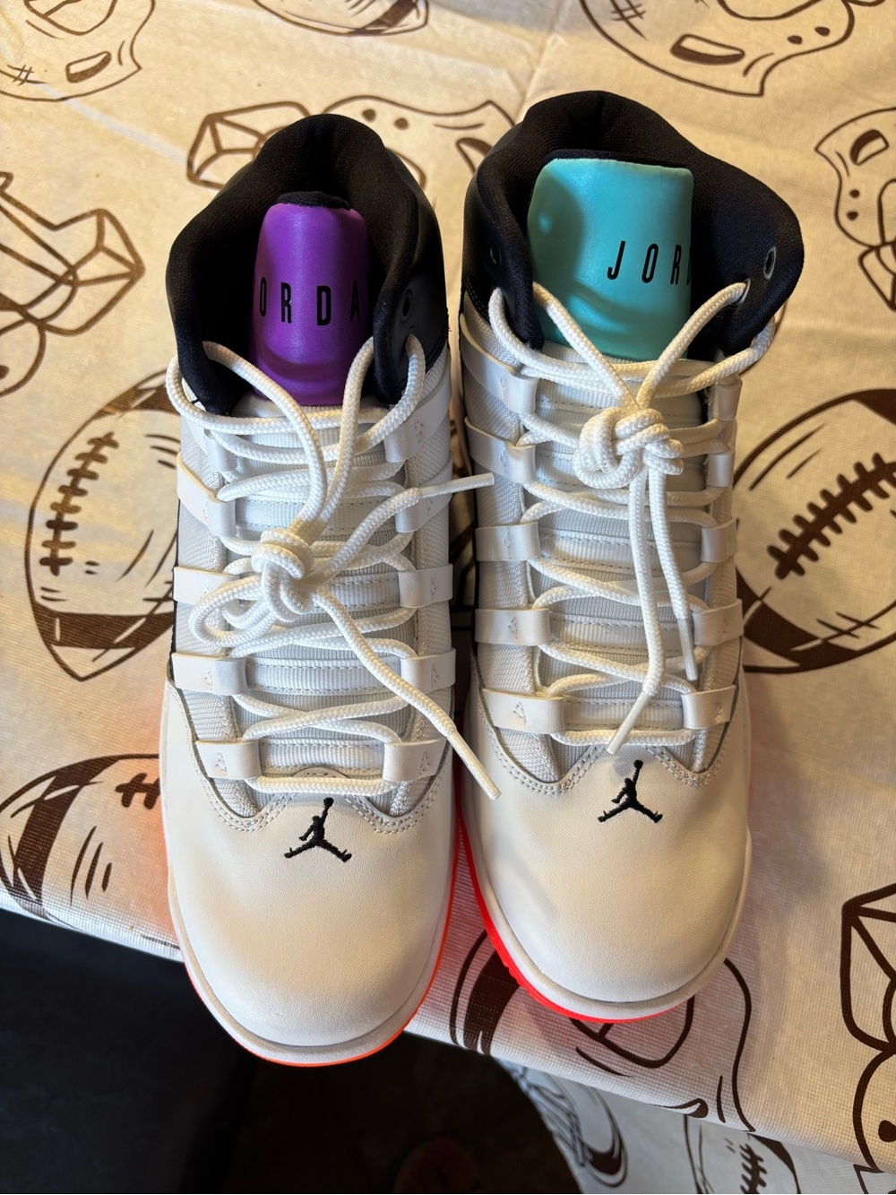 Jordan Kids White High-Top Sneakers with Purple & Teal Tongues